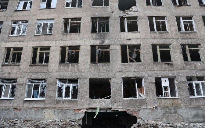 Destroyed building in blocked Mariupol