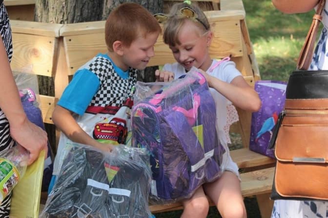 Карітас України та EPAM закликають доєднатися до всеукраїнської акції «Шкільний портфелик»