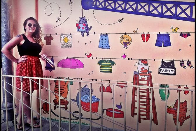 На стіні одного з двориків Львова з'явились кошенята та пташки