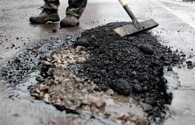 На вулицях Львова асфальтовуватимуть незамощені ділянки