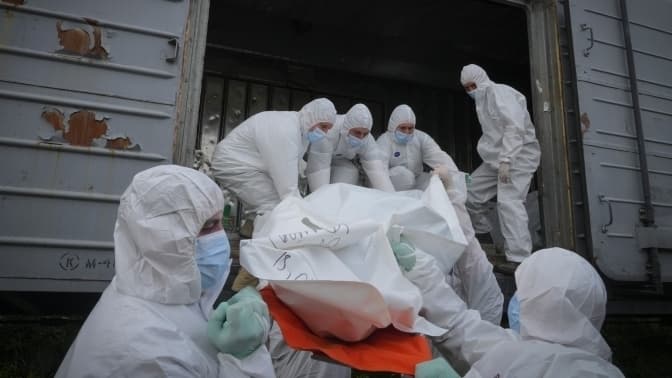 ТІЛА ЗАГИБЛИХ РОСІЙСЬКИХ ВІЙСЬКОВИХ / ФОТО ІЛЮСТРАТИВНЕ: AP