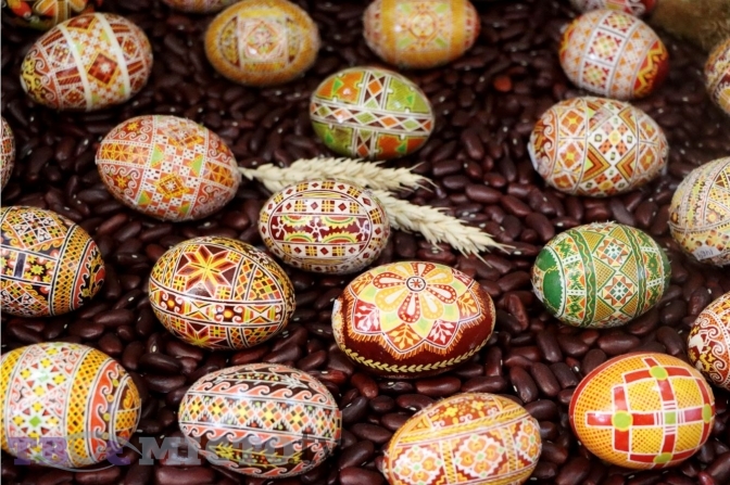 Lviv, Ukraine. 06th Apr, 2023. A young woman makes Easter eggs. A young  woman in traditional Ukrainian clothing makes Easter eggs using ancient  technology. Pysanka is an ancient tradition, one of the